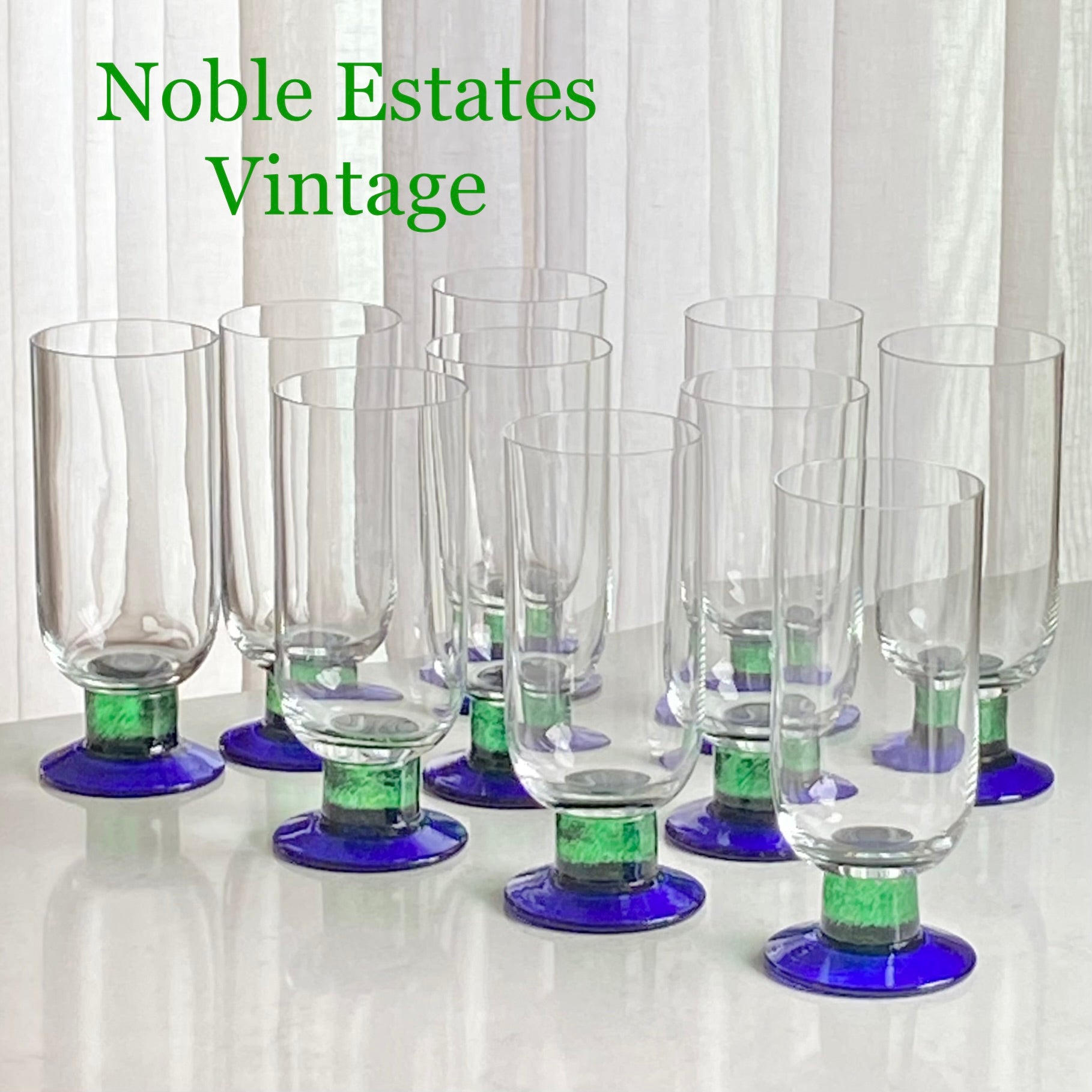 Vintage Fostoria green stem blue foot glasses for sale by Noble Estates Vintage.