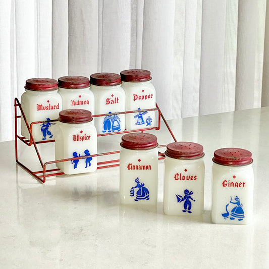 Vintage Dove spice jars and red metal rack make by the Frank Tea and Spice Company for sale by Noble Estates Vintage.