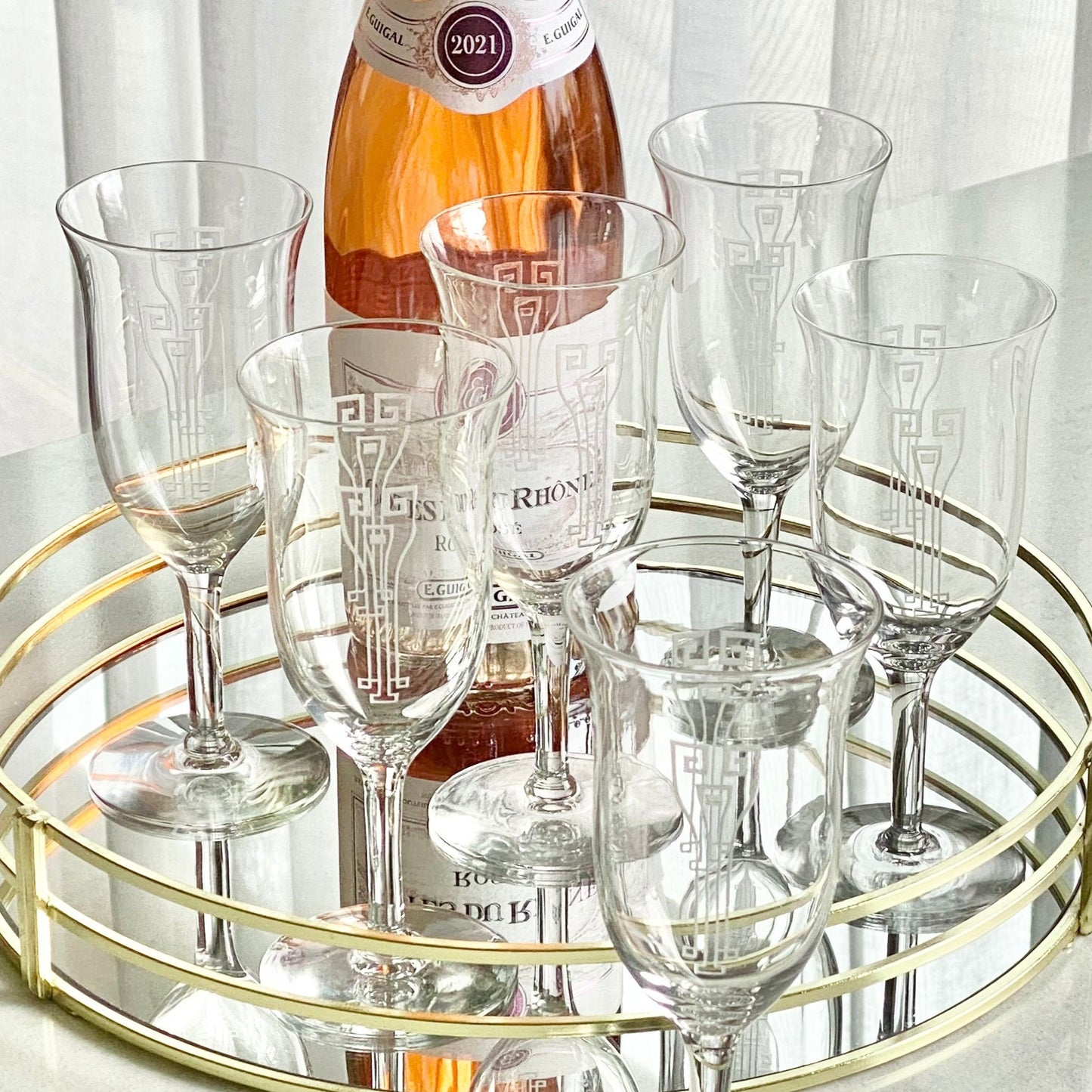 Vintage etched stemware with a Greek key design for sale by Noble Estates Vintage.